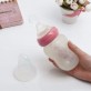 Силиконовая бутылочка для кормления с ложкой 180 мл "Розовая"